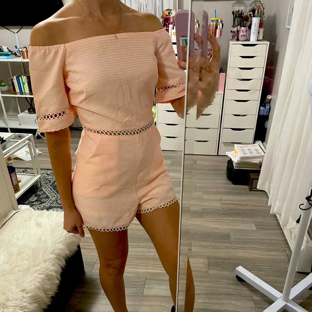 Pink and white pattern romper